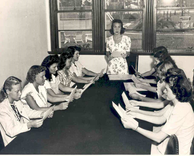Student Council President Patricia Kelly leads a Council meeting
